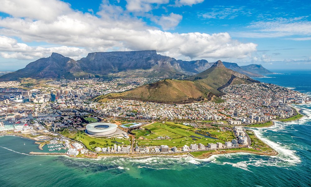 Picture taken from the sky to show Cape Town (south africa) with its coast side, buildings and mountain landscape