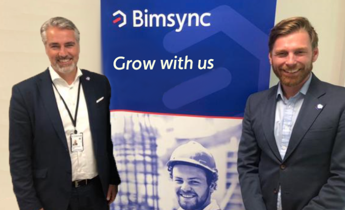 bimsync flyer (now Catenda), on the right Einar Gudmundsson (CEO), on the left Håvard Brekke Bell (Co-Founder and CSO) smiling