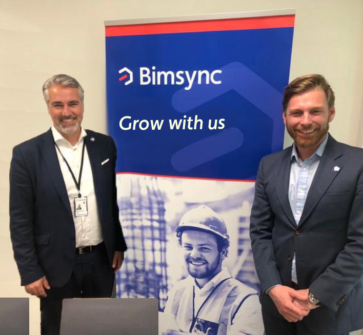 bimsync flyer (now Catenda), on the right Einar Gudmundsson (CEO), on the left Håvard Brekke Bell (Co-Founder and CSO) smiling