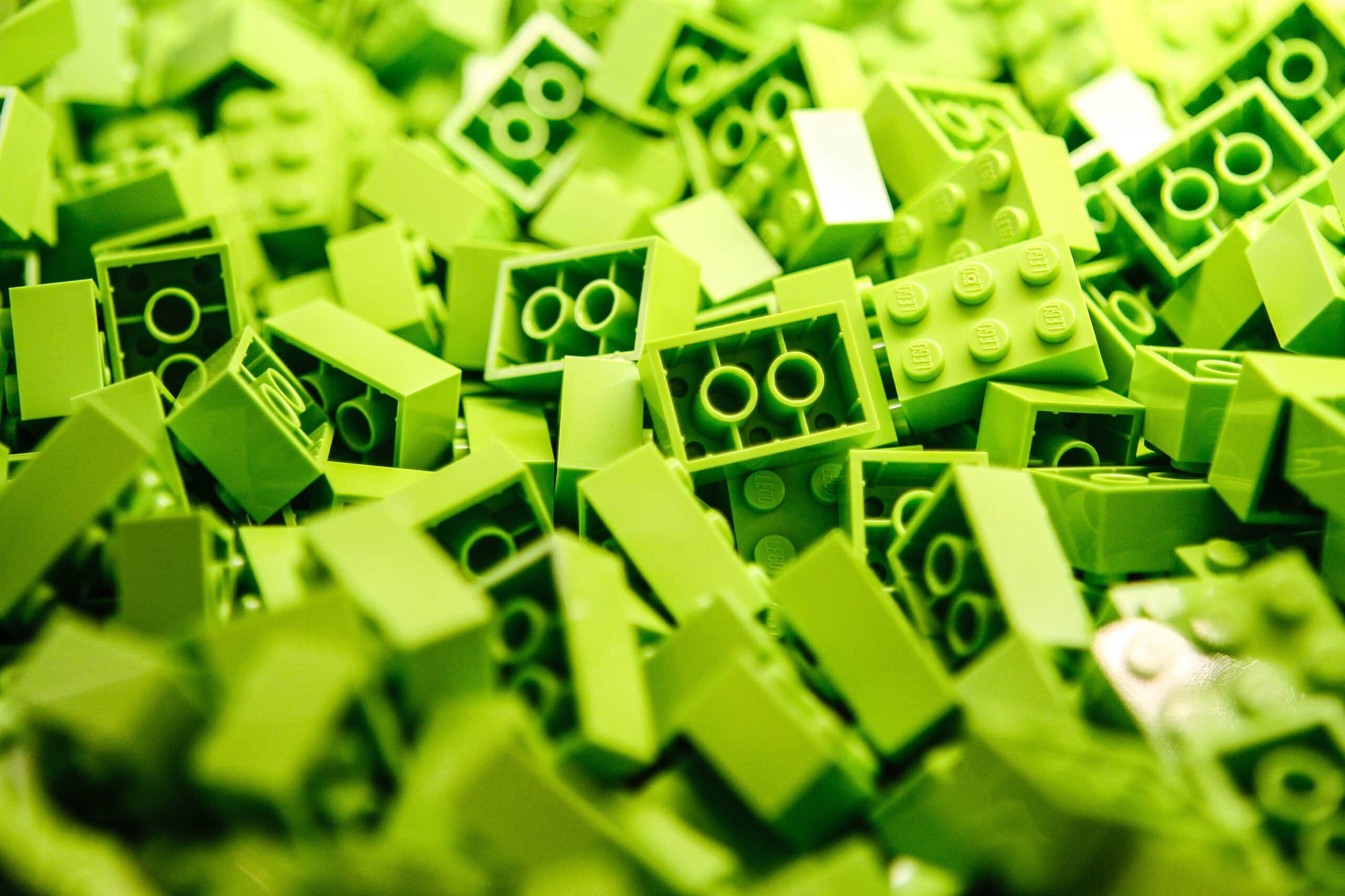 pile of a lot of green lego blocks